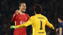 Berstatus tim tamu, Liverpool sukses mengalahkan tuan rumah Paris Saint-Germain (PSG) dengan skor tipis 1-0. (Anne-Christine POUJOULAT/AFP)