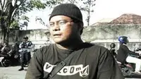 Sosok Pak Ogah yang beredar di Denpasar, Bali, itu berjiwa sosial tinggi. (Liputan6.com/Dewi Divianta)