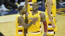 Pemain Cleveland Cavaliers, Kyrie Irving (2) dan LeBron James (23) merayakan kemenangan atas L.A. Lakers pada laga NBA di Quicken Loans Arena, Kamis (11/2/2016) WIB.  (David Richard-USA TODAY Sports/Reuters)