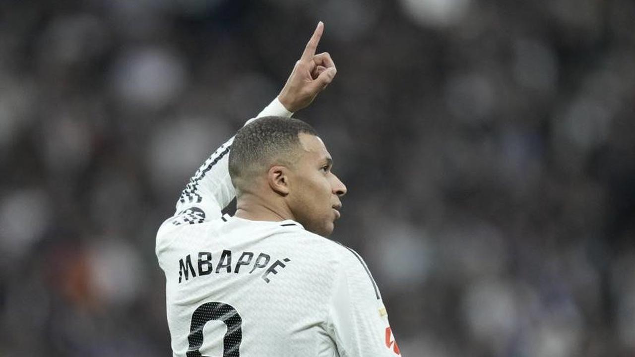 Kylan Mbappe melakukan selebrasi dalam laga Real Madrid vs Las Palmas di La Liga. (c) AP Photo/Bernat Armangue