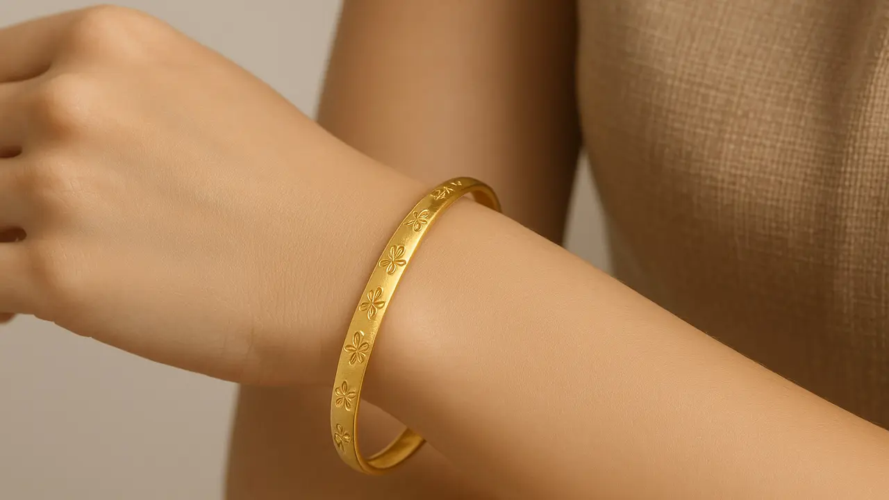 Model Gelang Emas 2 Gram 16 Karat Motif Bunga dan Kupu-Kupu/Ilustrasi AI