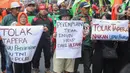Ratusan buruh tersebut berunjuk rasa menolak rencana pemberlakuan program Tabungan Perumahan Rakyat (Tapera) untuk seluruh pekerja. (Liputan6.com/Angga Yuniar)