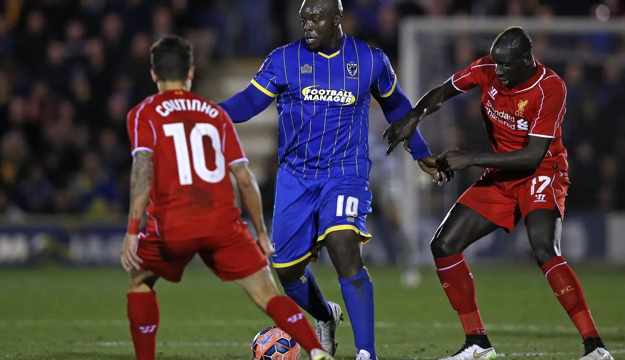 Saat ini Akinfwenwa masih meruput bersama Wycombe di kasta ketiga liga Inggris. Namun berta badan saat ini tidak menurunkan produktifitasnya dalam mencetak gol di lapangan. (AFP/Adrian Dennis)