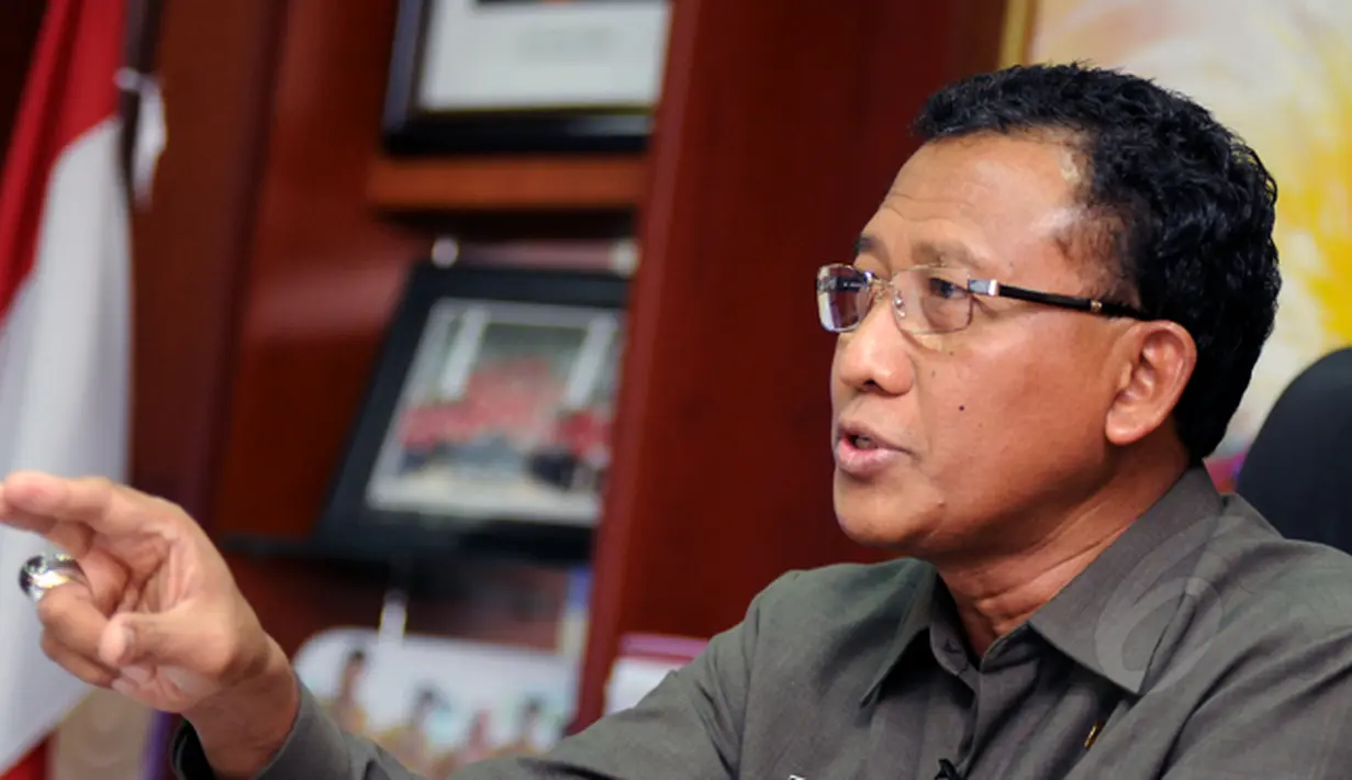 Jaksa Muda Pidana Khusus (Jampidsus), Widyopramono saat sesi wawancara khusus bersama Liputan6.com di ruang kerjanya, Gedung Bundar Kejaksaan Agung, Jakarta, Kamis (29/1/2015). (Liputan6.com/Helmi Fithriansyah)