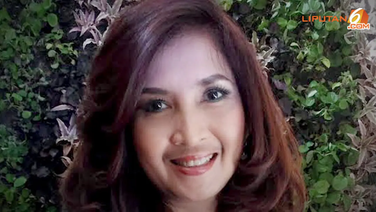 istri-roy-suryo-3-140127b.jpg