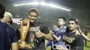 Ekspresi kiper Arema FC, Kurnia Meiga saat timnya meraih juara Piala Presiden 2017 di Stadion Pakansari, Bogor, Minggu (12/3/2017). (Bola.com/Nicklas Hanoatubun)