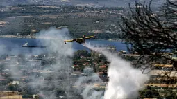 Kementerian Perlindungan Sipil Yunani telah mengeluarkan peringatan mengenai risiko kebakaran hutan di lima wilayah dan mengimbau masyarakat untuk menghindari kegiatan seperti membakar rumput liar yang dapat menyebabkan kebakaran. (Valerie GACHE/AFP)