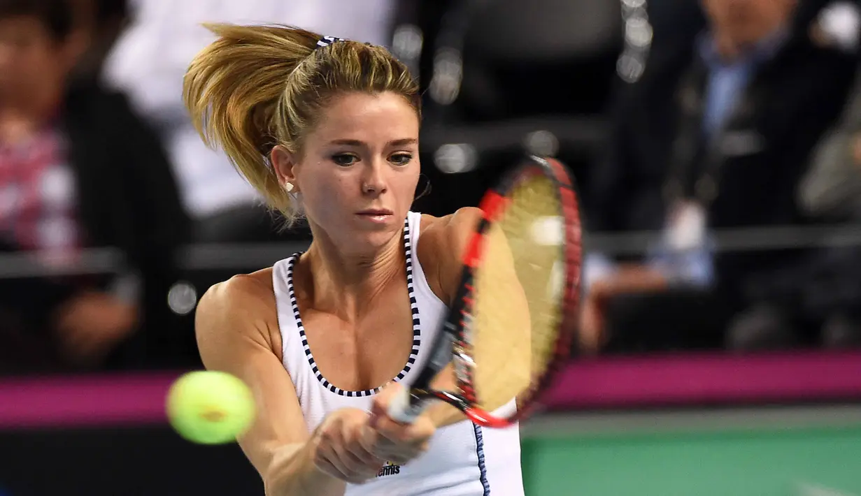 Sepanjang kariernya, Camila Giorgi, sudah meraih satu gelar juara WTA dan lima gelar juara ITF. (AFP/Anne-Christine Poujoulat)