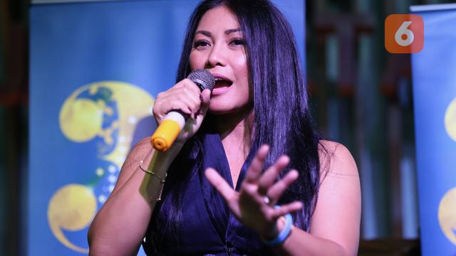 [Fimela] Anggun C Sasmi