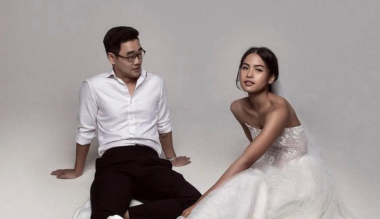 <p>Diabadikan oleh fotografer Hakim Satriyo dan stylist Imelda Untoro, Maudy dan Jesse tampil kompak bergaya klasik dalam balutan busana pengantin serba putih. (Foto: Instagram/maudyayunda)</p>