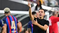 Pelatih Barcelona Xavi Hernandez ingin melihat mantan rekan satu timnya Lionel Messi kembali bermain untuk Blaugrana. Messi meninggalkan Barcelona pada musim panas 2021 dan bergabung dengan Paris Saint-Germain. (Frederic J. BROWN / AFP)