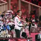 Presiden Joko Widodo tersenyum saat memberikan sambutan sekaligus membuka secara resmi PON Papua di Stadion Lukas Enembe, Kompleks Olahraga Kampung Harapan, Distrik Sentani Timur, Kabupaten Jayapura, Papua, Sabtu (2/10/2021). (ANTARA FOTO via InfoPublik/Nova Wahyudi)