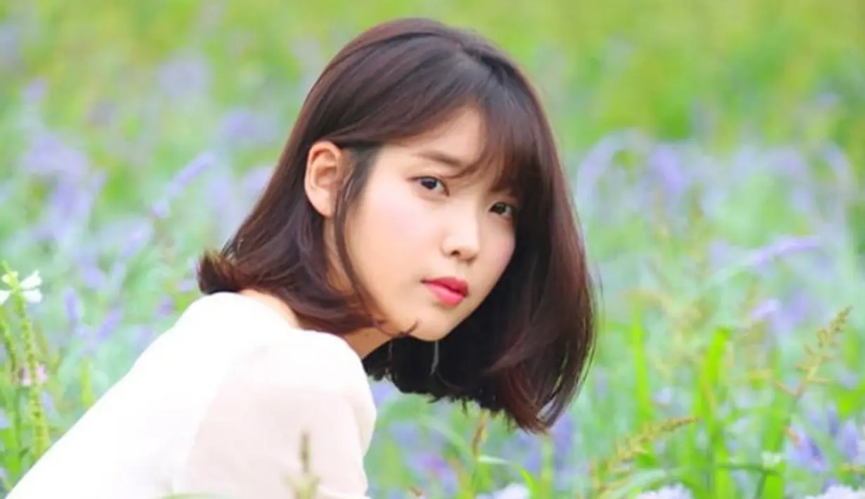 Berdasarkan jajak pendapat yang dikeluarkan oleh Gallup Korea, menyebutkan jika IU dianggap sebagai penyanyi tersukses di Korea Selatan. Ia berhasil meraih 15,2% suara dari 4200 audiens. (Foto: Soompi.com)