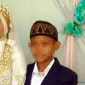 Pasangan yang melangsungkan pernikahan dini, mempelai perempuan IB (15) dan mempelai laki-laki ZA (13). (Rasidi Fadli/Radar Banjarmasin/Jawa Pos Group)