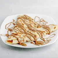 Ilustrasi crepes coklat./Copyright freepik.com/author/azerbaijan-stockers