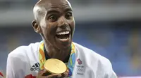 Meski sempat terjatuh, Mo Farah sukses merebut emas cabang atletik nomor 10.000 m Olimpiade 2016 Rio de Janeiro. (Reuters)