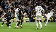 Real Madrid behasil merengkuh kemenangan 4-1 atas Elche pada laga pekan ke-28 La Liga di Santiago Bernabeu, Minggu (15/03/2026) dini hari WIB. (AFP/Oscar DEL POZO)