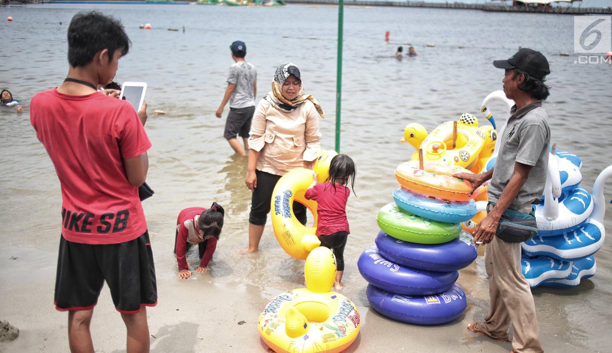 FOTO: Libur Natal 2018, Pantai Ancol Sepi Pengunjung ...