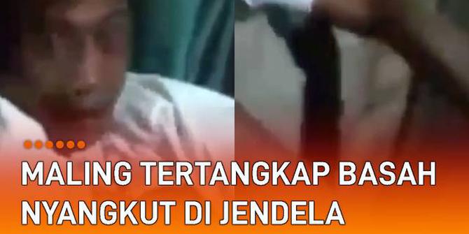 VIDEO: Maling di Medan Tertangkap Basah Nyangkut di Jendela