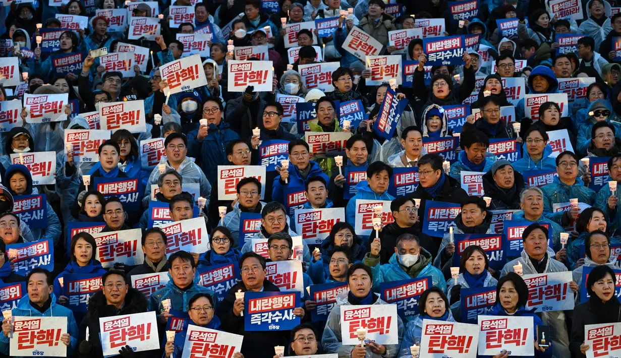 Pihak oposisi menyatakan bahwa pemberlakukan kebijakan darurat militer melanggar prinsip dasar konstitusi, termasuk kedaulatan rakyat. (JUNG Yeon-je/AFP)