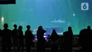 Wisatawan melihat ikan di tempat wisata kawasan Ancol, Jakarta, Minggu (8/1/2023). Saat ini kinerja sektor pariwisata dan ekonomi kreatif pada 2023 dihadapkan dengan target yang cukup tinggi. Kunjungan wisman diharapkan mencapai angka 7,4 juta dan wisatawan nusantara mencapai 1,2-1,4 miliar pergerakan. (Liputan6.com/Angga Yuniar)
