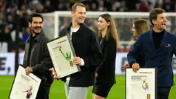 Keempat pemain itu adalah kiper Manuel Neuer, dua gelandang andalan Jerman, Toni Kroos dan Ilkay Gundogan, serta penyerang andal Thomas Muller. (AP Photo/Matthias Schrader)