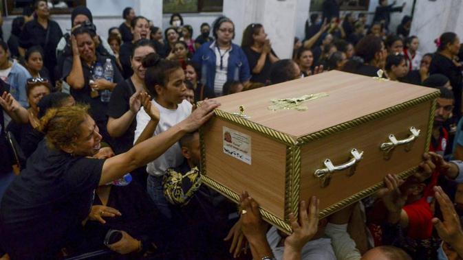 <p>Kebakaran di Gereja Koptik Mesir, 14 Agustus 2022. Dok: AP Photo/Tarek Wajeh</p>