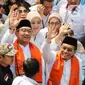 Bakal calon gubernur dan wakil gubernur DKI Jakarta, Ridwan Kamil-Suswono berjalan menuju kantor Komisi Pemilihan Umum (KPU) Provinsi DKI Jakarta, Rabu (28/8/2024). (Liputan6.com/Herman Zakharia)