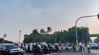 Lalu Lintas di Sekitar Monas, Jakarta Pusat Ramai Lancar Saat Reuni 212 pada Senin (2/12/2019). (Foto: Rizki Putra Aslendra/Liputan6.com)