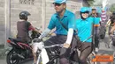 Citizen6, Surabaya: Dankobangdikal didampingi istri beserta 100 orang Pejabat Kobangdikal lainnya bersepeda santai bersama melintasi Selat Madura, Selasa (19/4). (Pengirim: Penerangan Kobangdikal) 