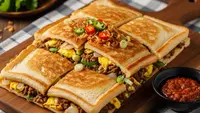 Cara Membuat Martabak Roti Tawar Teflon Isi Sederhana, Camilan Praktis di Rumah