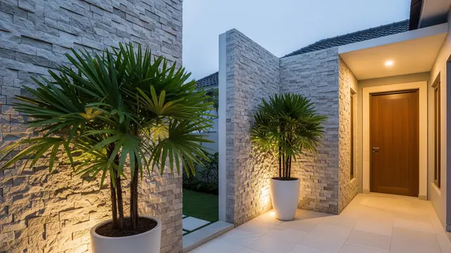 Model Teras dengan Batu Alam dan Palem Kipas untuk Rumah Type 36/AI Generated