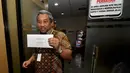 Mantan Mendikbud, M Nuh usai melaporkan harta kekayaannya ke KPK, Jakarta, Selasa (9/12/2014). (Liputan6.com/Miftahul Hayat) 