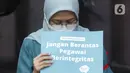 Pegawai KPK nonaktif bersama pegiat anti korupsi melakukan aksi di depan Gedung ACLC KPK, Kuningan, Jakarta, Rabu (15/9/2021). Pegawai KPK nonaktif dan pegiat anti korupsi mendirikan kantor darurat pemberantasan korupsi sebagai bentuk kekecewaan terhadap kinerja KPK (Liputan6.com/Helmi Fithriansyah)
