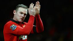 Wayne Rooney - Keputusan tepat diambil Sir Alex Ferguson saat memboyong remaja berusia 18 tahun ini dengan harga 33 juta pounds atau Rp647,7 miliar. Rooney muncul menjadi mesin gol dan tercatat sebagai top skor sepanjang masa MU dengan koleksi 253 gol dari 559 pertandingan. (AFP/Andrew Yates)