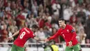 Portugal sejatinya sempat tertinggal lebih dulu akibat gol Scott McTominay di awal laga. Tuan rumah mampu bangkit di babak kedua lewat gol-gol yang dicetak Bruno Fernandes dan Cristiano Ronaldo. (AFP/Patricia De Melo Moreira)