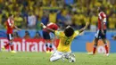 Selebrasi pemain belakang Timnas Brasil, Marcelo, usai menekuk Kolombia 2-1 di laga perempat final Piala Dunia 2014 di Stadion Castelao, Fortaleza, (5/7/2014). (REUTERS/Marcelo Del Pozo)