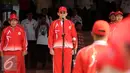 Gubernur DKI Jakarta, Basuki Tjahaja Purnama (tengah) saat mengikuti upacara pelepasan kontingen atlet yang akan berlaga di PON XIX Jabar di halaman Balaikota Jakarta, Rabu (7/9). DKI Jakarta menerjunkan 1.258 atlet. (Liputan6.com/Helmi Fithriansyah)