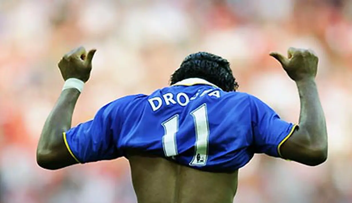 Aksi striker Chelsea, Didier Drogba setelah mencetak gol kemenangan kontra Arsenal di babak semifinal Piala FA di Wembley Stadium, London, 18 April 2009. Chelsea menang 2-1. AFP PHOTO/Adrian Dennis
