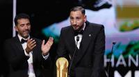 Kiper Manchester City,&nbsp;Gianluigi Donnarumma, berhasil meraih&nbsp;penghargaan kiper terbaik,&nbsp;Yashin Trophy, pada acara Ballon d'Or 2025 di&nbsp;Theatre du Chatelet, Paris, Selasa (23/9/2025) dini hari WIB. (AFP/Franck Fife)