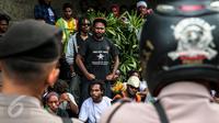 Ratusan orang Papua yang berdomisili di Pulau Jawa dan Bali melakukan aksi turun ke jalan memperingati 1 Desember di Bundaran HI, Jakarta, Selasa (1/12). Tanggal 1 Desember juga diartikan sebagai hari kemerdekaan Papua. (Liputan6.com/Faizal Fanani)