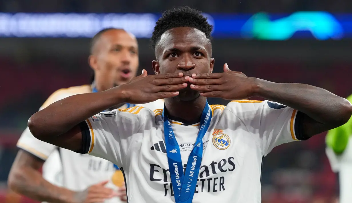 Vinicius Junior menjadi salah satu bintang kemenangan Real Madrid di final Liga Champions 2023/2024. (AP Photo/Kirsty Wigglesworth)