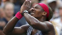 Ekspresi Serena Williams setelah memenangi AS Terbuka 2014 dengan mengalahkan Caroline Wozniacki. (AP Photo/Mike Groll)