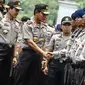 Kapolri Jenderal Pol Sutarman saat mengahadiri apel pengamanan pelantikan presiden dan wakil presiden di halaman Monumen Nasional, Jakarta, Jumat (17/10/2014) (Liputan6.com/Faizal Fanani)