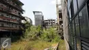 Selain diselimuti tanaman liar, bangunan yang masih setengah jadi terlihat kusam dan tidak terawat, Jawa Barat, Minggu (4/9). Proyek Hambalang ini sudah 4 tahun mangkrak. (Liputan6.com/Helmi Afandi)