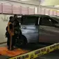 Mobil di basement DPRD Riau tempat penemuan jasad perempuan bunuh diri. (Liputan6.com/M Syukur)