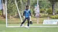 Kiper ketiga Arema FC, Dicki Agung Setiawan. (Bola.com/Iwan Setiawan)