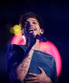 Nasib baik sedang tak berpihak pada salah satu anggota boyband, One Direction, Louis Tomlinson. (AFP/Bintang.com)