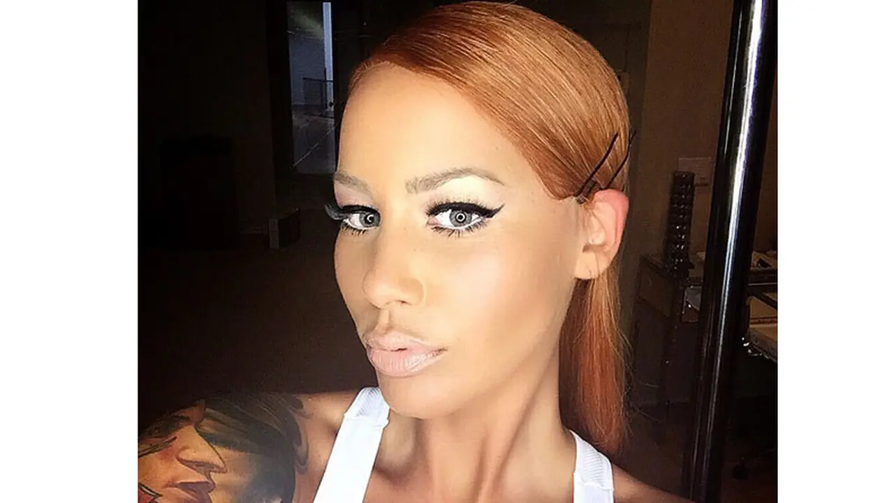 Pamer Rambut Baru, Amber Rose Goda Wiz Khalifa?