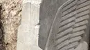 Sebuah penggalian di Irak utara telah menemukan patung pualam berusia 2.700 tahun yang menggambarkan Dewa Assyria bersayap, Lamassu, yang ditemukan dalam keadaan utuh meskipun ukurannya besar. (Zaid AL-OBEIDI / AFP)